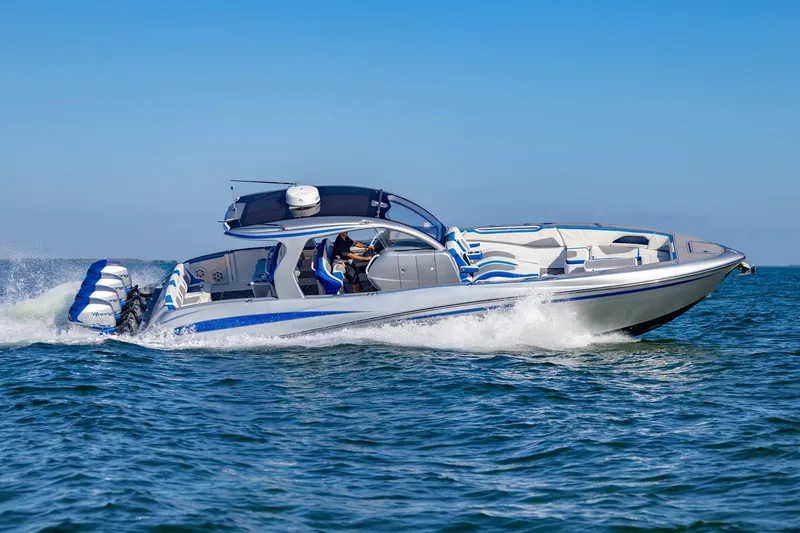 Slide: The Image of 2019 Deep Impact 399 Sport boat cruising on open water. - 48