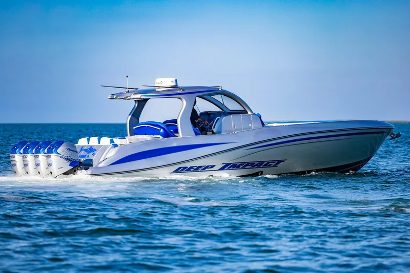 Slide: The Image of 2019 Deep Impact 399 Sport boat cruising on open water. - 7