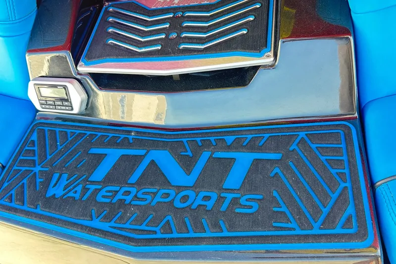 Slide: The Image of 2019 Malibu Wakesetter 24 MXZ interior with TNT Watersports branding. - 11