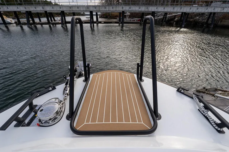 Slide: The Image of Bow view of 2026 Targa 27.2 boat with deck and railing. - 15