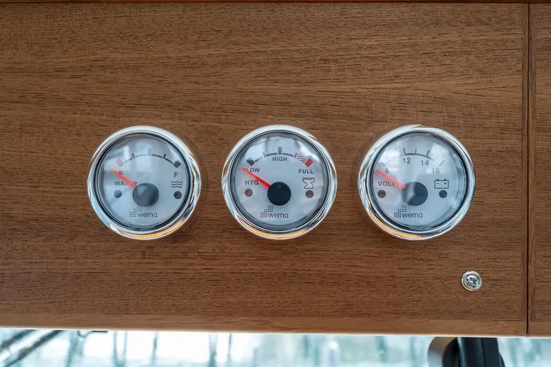 Slide: The Image of Three Wema gauges on a Targa 27.2 boat dashboard, 2026 model. - 38