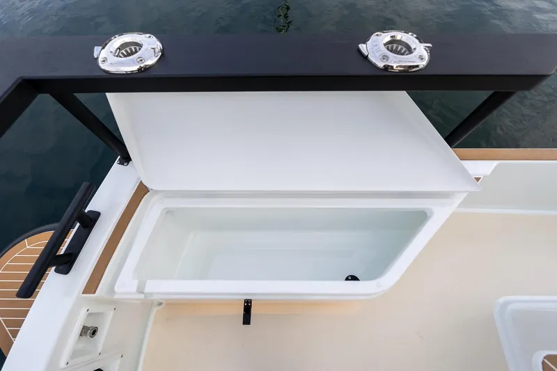 Slide: The Image of Open storage compartment on 2026 Targa 27.2 boat, featuring sleek design and functionality. - 4