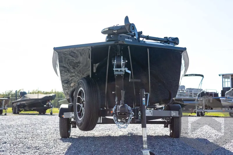 Slide: The Image of 2026 G3 Sportsman 1610 boat on trailer, parked on gravel lot. - 11