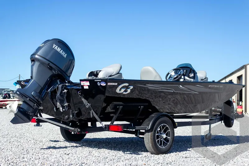 Slide: The Image of 2026 G3 Sportsman 1610 boat with Yamaha motor on gravel lot. - 13