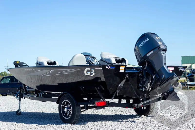 Slide: The Image of 2026 G3 Sportsman 1610 boat with Yamaha engine on a trailer. - 17