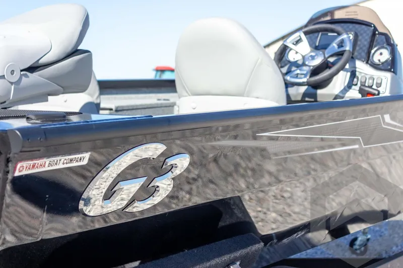 Slide: The Image of 2026 G3 Sportsman 1610 boat interior with steering wheel and seating. - 22