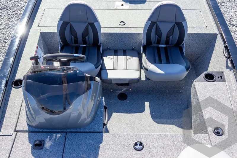 Slide: The Image of 2026 G3 Sportsman 1610 boat interior with dual seats and steering console. - 32