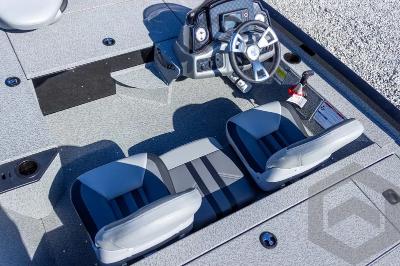 Slide: The Image of 2026 G3 Sportsman 1610 boat interior with dual seats and modern steering console. - 34