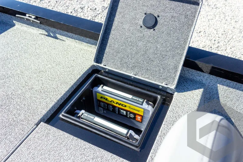 Slide: The Image of Storage compartment in 2026 G3 Sportsman 1610 boat with Plano tackle boxes. - 44