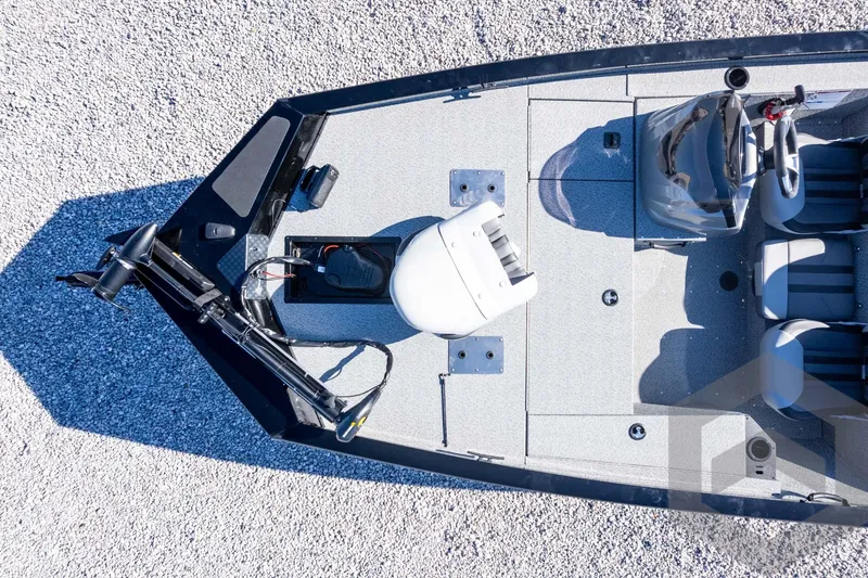 Slide: The Image of 2026 G3 Sportsman 1610 boat interior with seating and equipment, top view. - 47