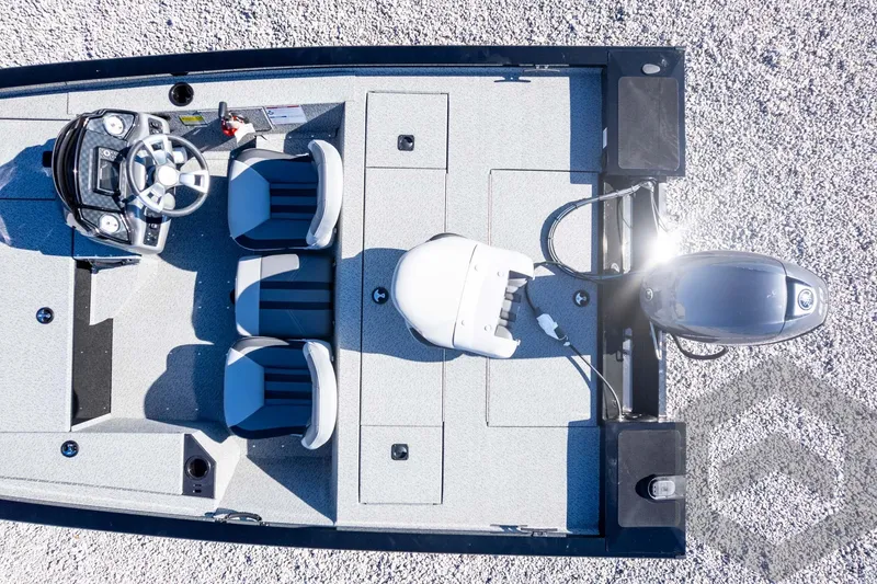 Slide: The Image of Overhead view of 2026 G3 Sportsman 1610 boat with seating and motor. - 48