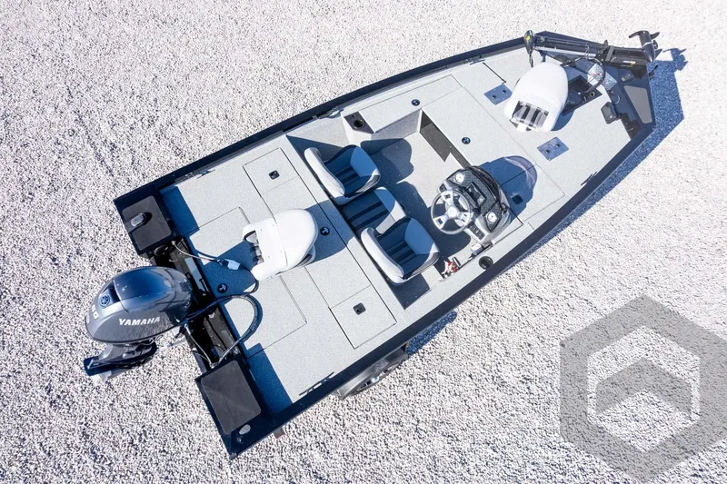 Slide: The Image of 2026 G3 Sportsman 1610 boat with Yamaha engine, aerial view on gravel surface. - 53