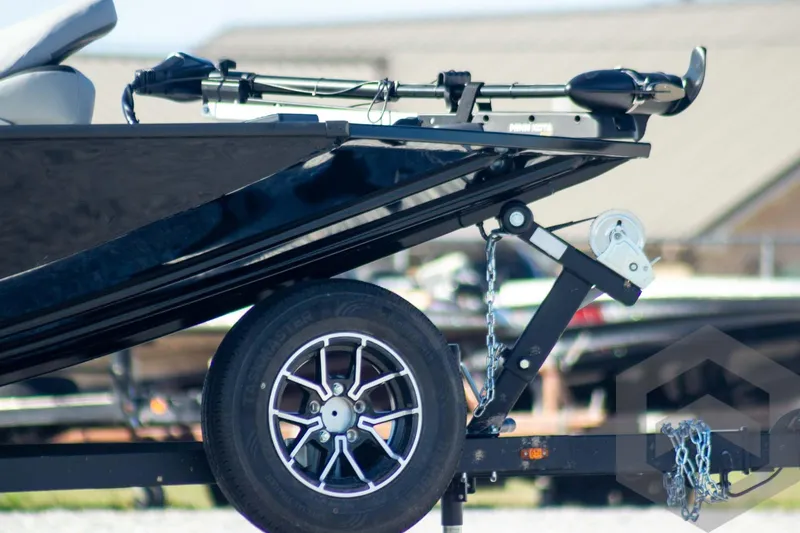 Slide: The Image of 2026 G3 Sportsman 1610 boat trailer with wheel and winch detail. - 7