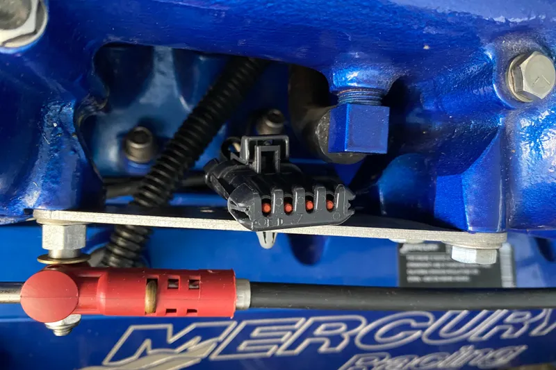 Slide: The Image of Close-up of a Mercury Racing engine component in a 2006 Formula 400 Super Sport boat. - 16