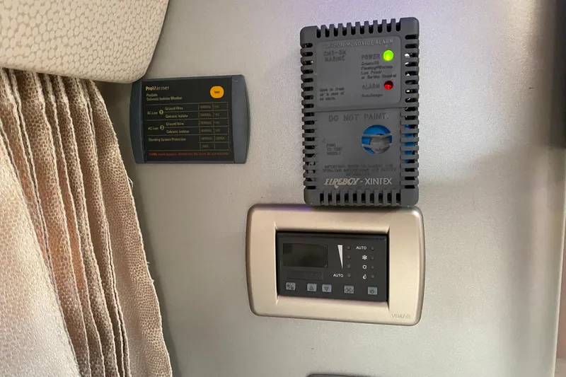 Slide: The Image of 2006 Formula 400 Super Sport interior with carbon monoxide alarm and control panel. - 24