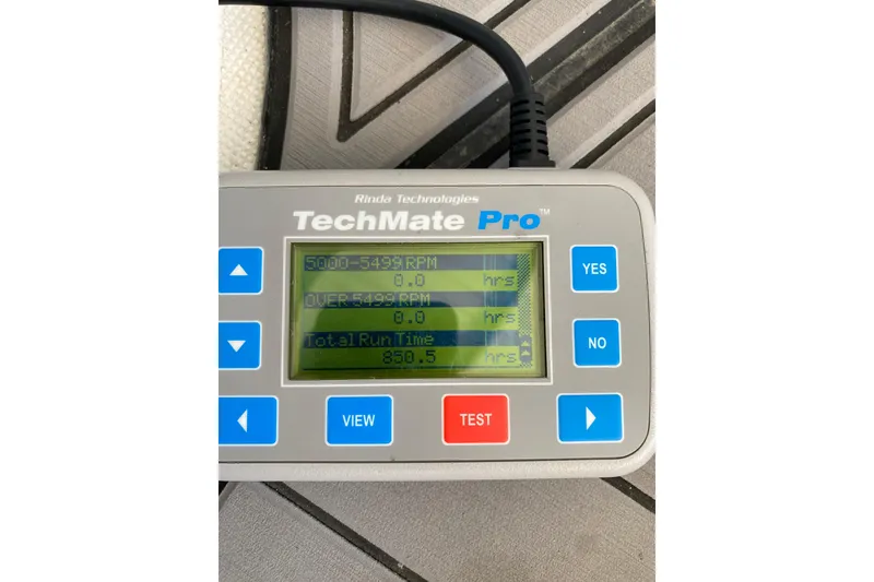 Slide: The Image of TechMate Pro diagnostic tool displaying engine runtime data for 2006 Formula 400 Super Sport. - 37
