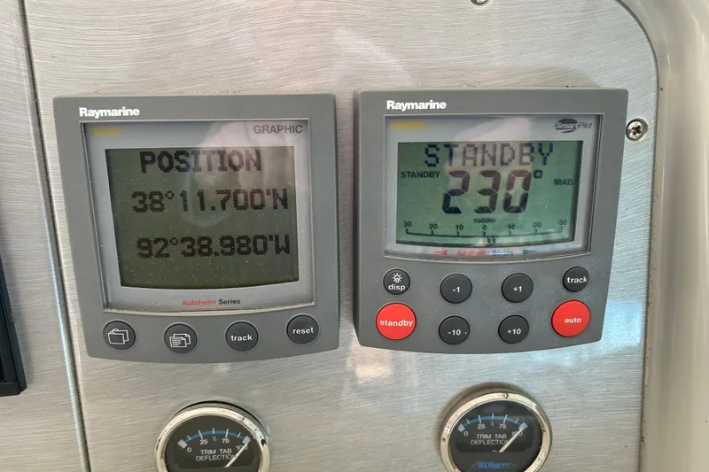 Slide: The Image of Raymarine navigation displays on 2006 Formula 400 Super Sport boat, showing position and heading. - 44