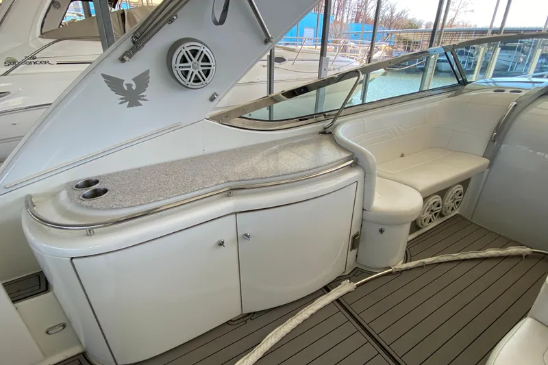 Slide: The Image of 2006 Formula 400 Super Sport yacht interior with seating and storage. - 8