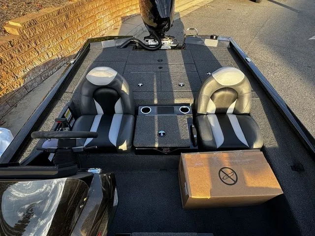 Slide: The Image of 2024 Vexus AVX2080 boat interior with dual seats and console, featuring modern design elements. - 13