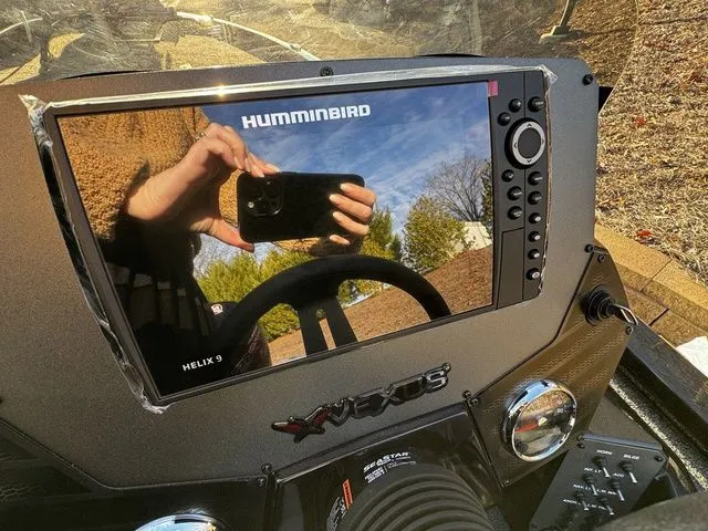 Slide: The Image of 2024 Vexus AVX2080 dashboard with Humminbird Helix 9 fishfinder display. - 8