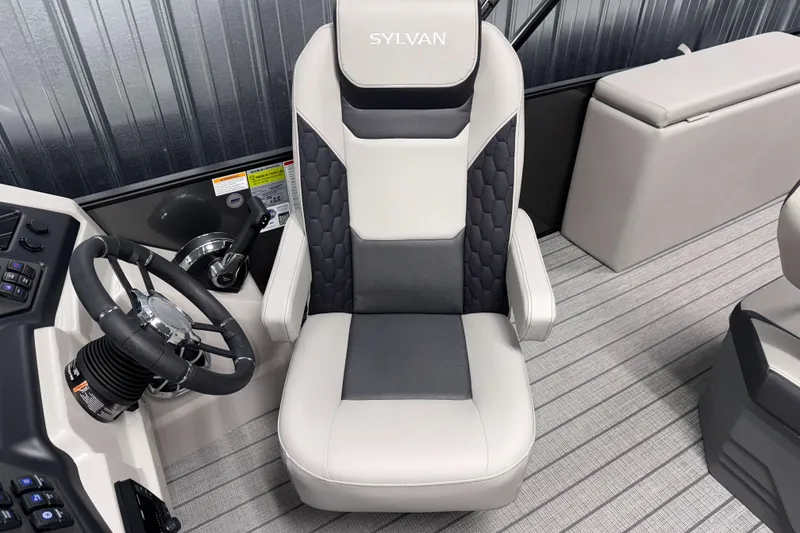 Slide: The Image of Captain's chair in 2026 Sylvan L3 DLZ boat, featuring sleek design and modern controls. - 11