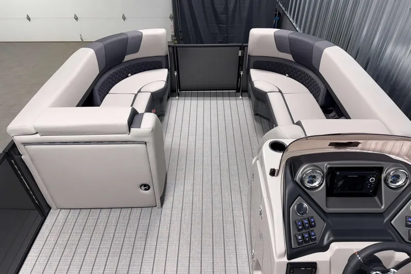 Slide: The Image of Luxurious interior of 2026 Sylvan L3 DLZ pontoon boat with plush seating and modern dashboard. - 6