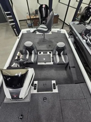 Slide: The Image of 2024 Vexus AVX2080 boat interior with gray seating and modern dashboard. - 3