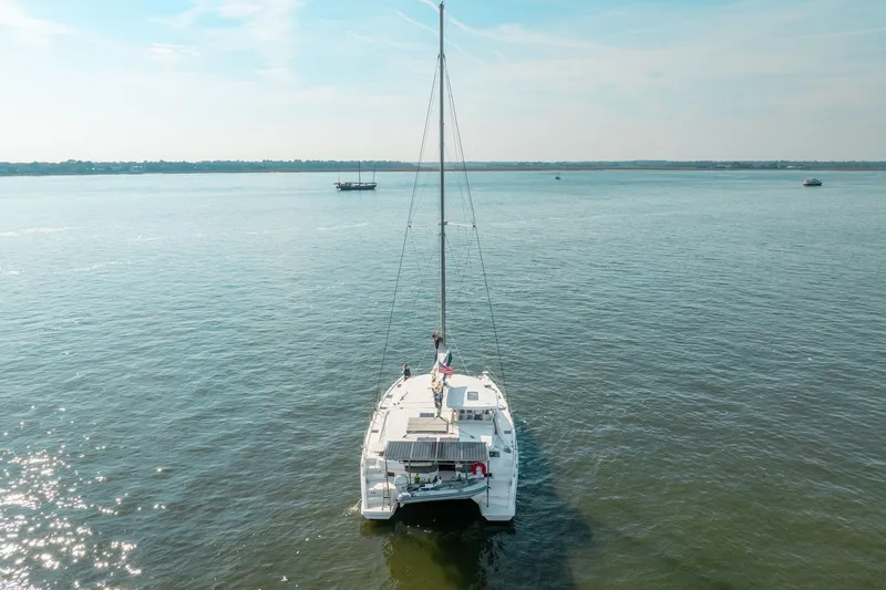 Slide: The Image of Aerial view of a 2016 Leopard 48 catamaran sailing on calm waters. - 17