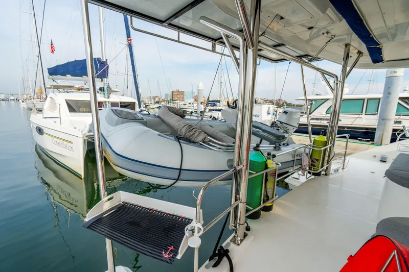 Slide: The Image of Leopard 48 yacht, 2016 model, docked with inflatable boat and scuba tanks. - 36