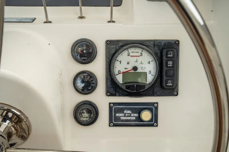 Slide: The Image of Control panel of a 2016 Leopard 48 yacht with gauges and switches. - 44