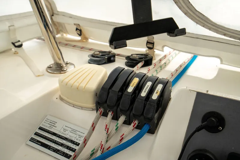 Slide: The Image of Control panel of a 2016 Leopard 48 yacht with labeled rope clutches. - 45
