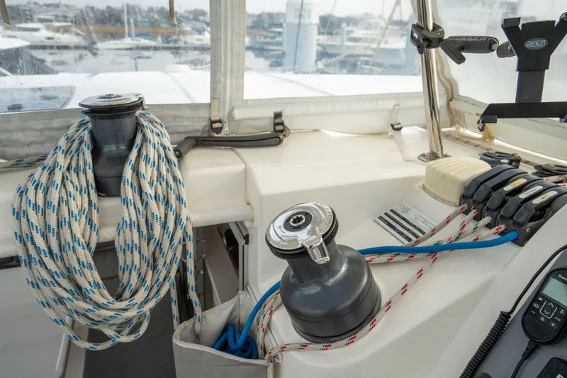 Slide: The Image of Cockpit of 2016 Leopard 48 yacht with winches and ropes. - 46
