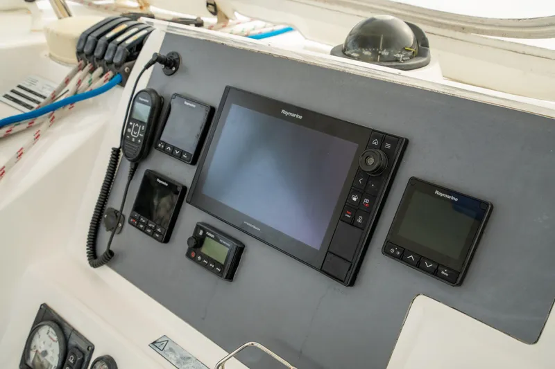 Slide: The Image of Control panel of a 2016 Leopard 48 yacht with navigation instruments. - 48
