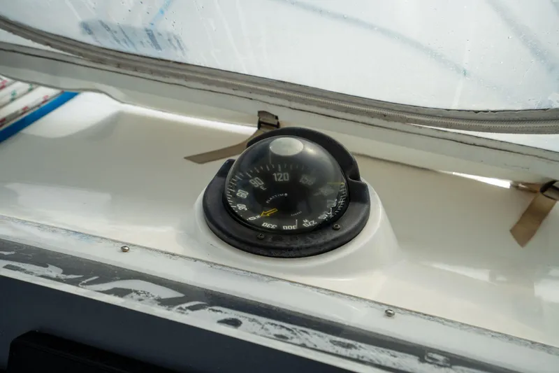 Slide: The Image of Compass on a 2016 Leopard 48 yacht, displaying navigation details. - 50