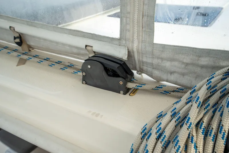 Slide: The Image of Close-up of a 2016 Leopard 48 sailboat's rope and pulley system. - 51