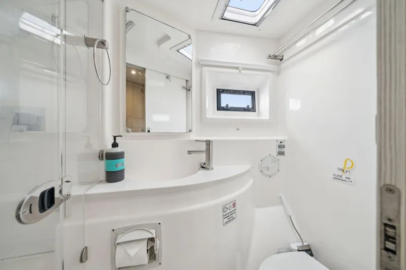 Slide: The Image of Modern bathroom in 2016 Leopard 48 yacht with skylight and sleek fixtures. - 85