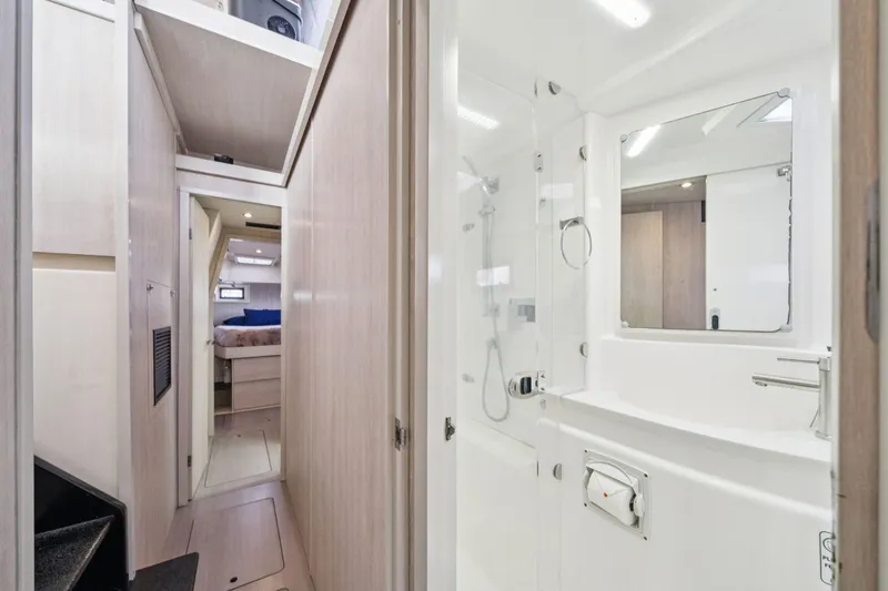 Slide: The Image of Luxurious interior of 2016 Leopard 48 yacht featuring modern bathroom and cozy bedroom. - 89