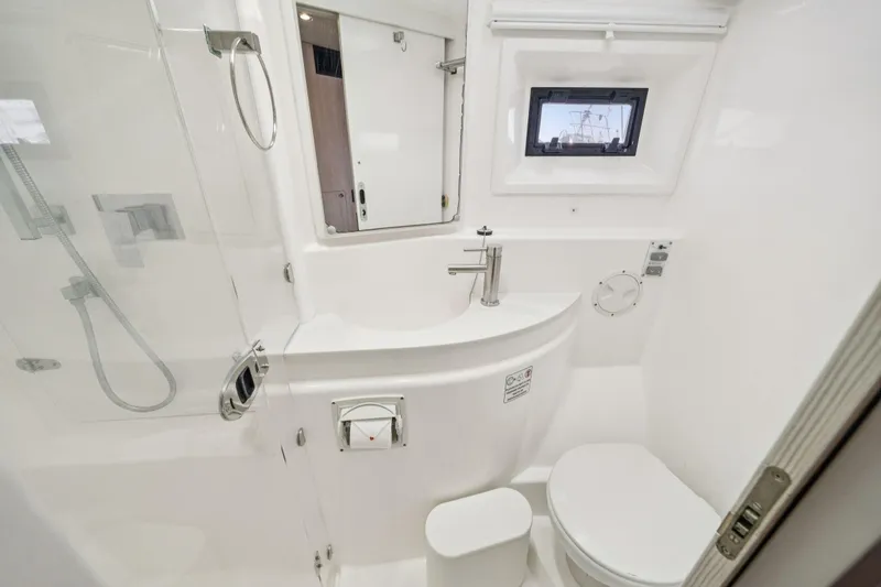 Slide: The Image of Modern bathroom in 2016 Leopard 48 yacht, featuring sleek fixtures and compact design. - 90