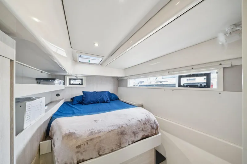 Slide: The Image of Luxurious cabin interior of 2016 Leopard 48 yacht with cozy bed and modern design. - 93