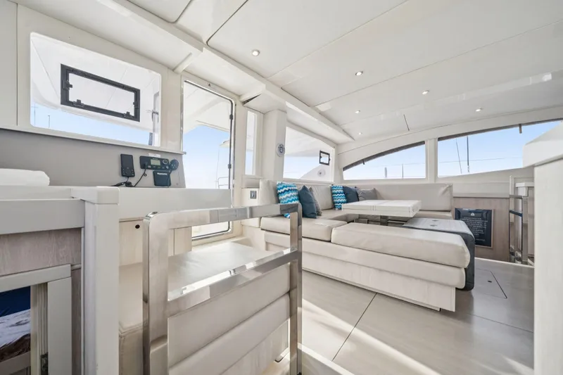 Slide: The Image of Luxurious interior of 2016 Leopard 48 yacht with modern seating and panoramic windows. - 94