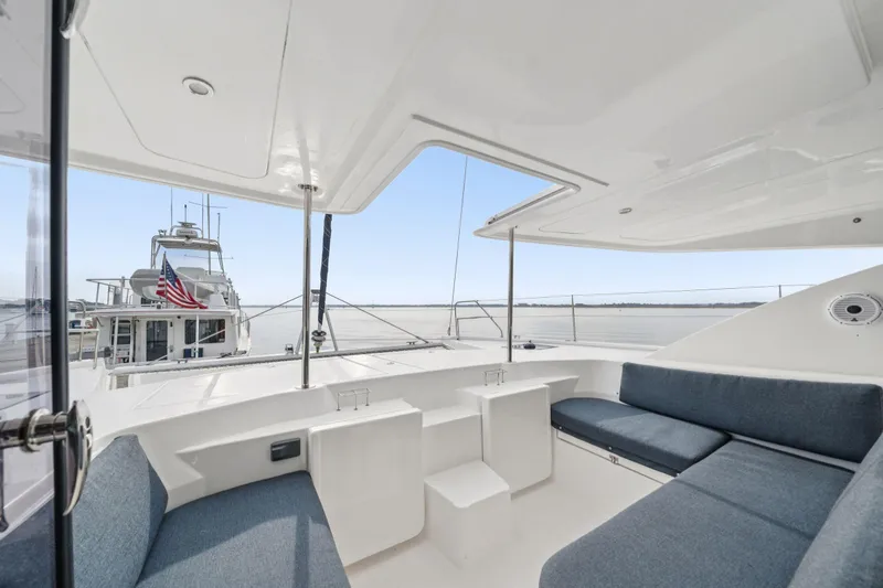 Slide: The Image of Spacious deck of 2016 Leopard 48 yacht with comfortable seating and ocean view. - 96