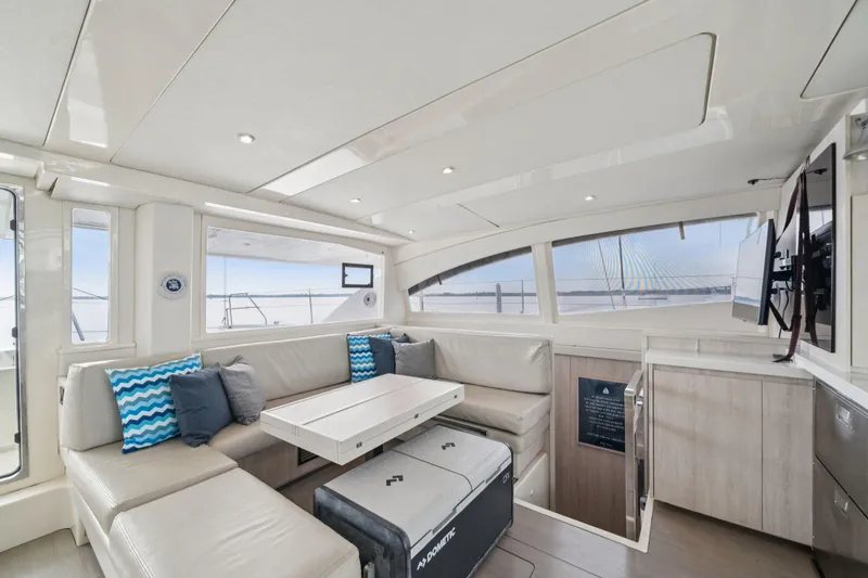 Slide: The Image of Luxurious interior of 2016 Leopard 48 yacht with modern seating and ocean view. - 99