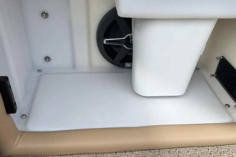 Slide: The Image of 2025 Barletta Cabrio 24U interior detail with speaker and storage compartment. - 13