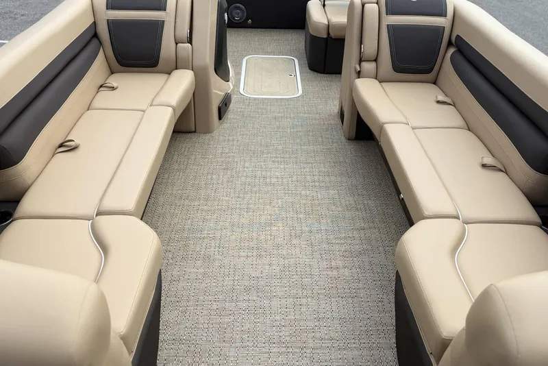 Slide: The Image of Luxurious interior of 2025 Barletta Cabrio 24U pontoon boat with beige seating. - 4