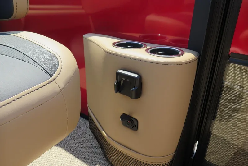 Slide: The Image of 2026 Barletta Cabrio 24UC interior with beige upholstery and dual cup holders. - 10