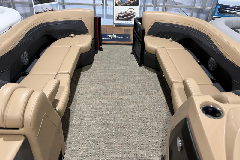 Slide: The Image of Luxurious interior of 2026 Barletta Cabrio 24UC pontoon boat with beige seating. - 4