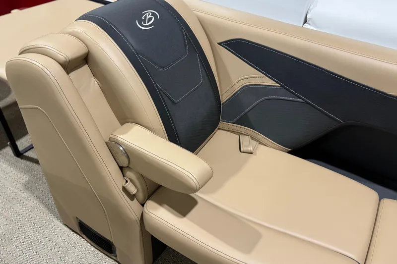 Slide: The Image of 2026 Barletta Cabrio 24UC boat seat with beige and black upholstery design. - 8