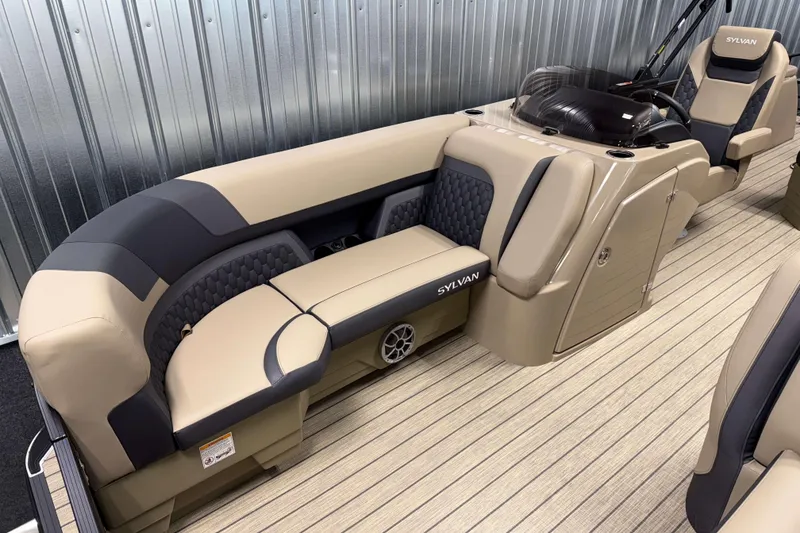 Slide: The Image of Luxurious 2026 Sylvan L3 DLZ pontoon boat interior with plush seating and modern design. - 3
