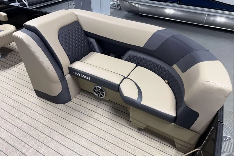 Slide: The Image of 2026 Sylvan L3 DLZ boat seating with beige and gray upholstery, featuring a built-in speaker. - 6