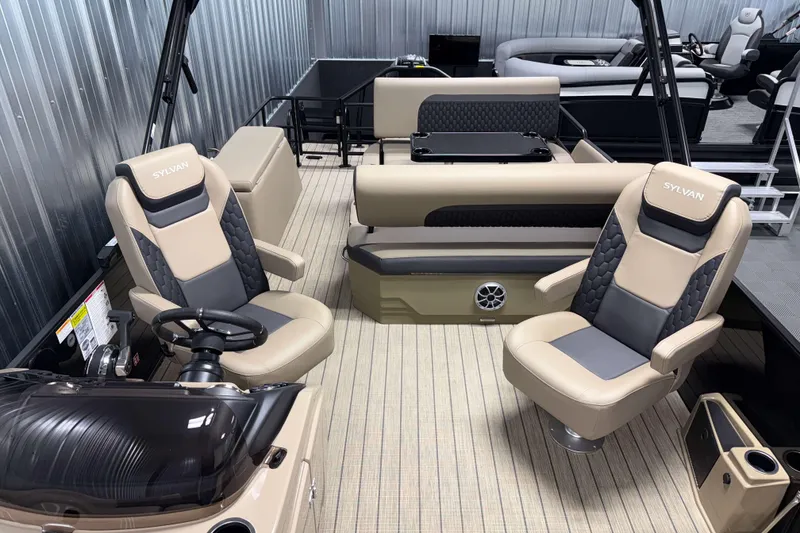 Slide: The Image of 2026 Sylvan L3 DLZ pontoon boat interior with luxurious seating and modern design. - 9